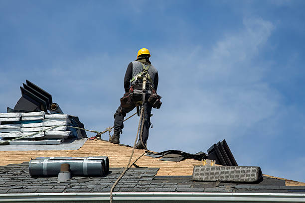 Professional Roofing technician working in Cambria Heights, NY